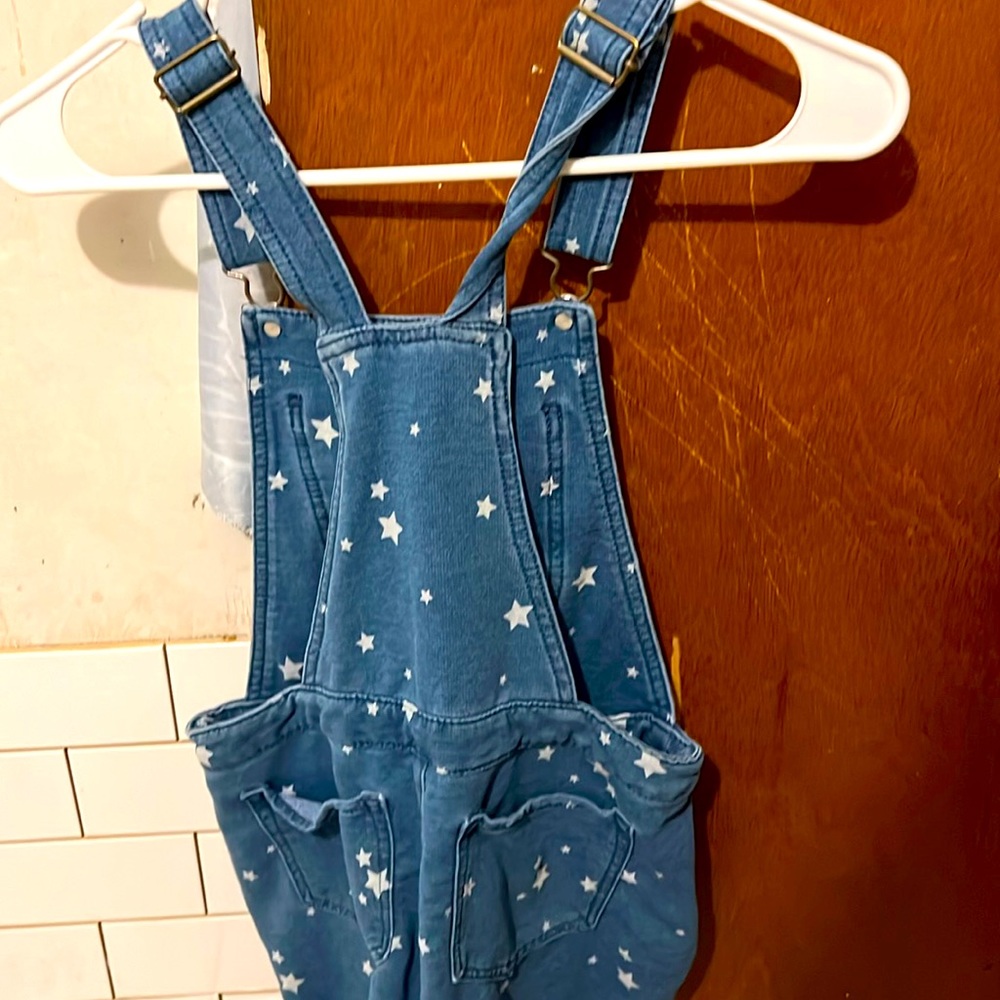 Hello Ty for checking out my page I am selling an overall very cute.